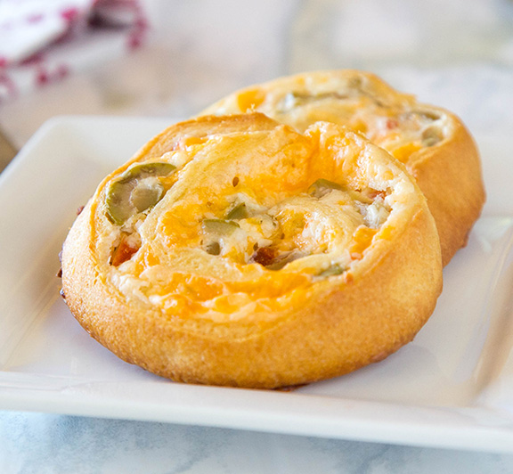 Cheesy Green Olive Pinwheels
