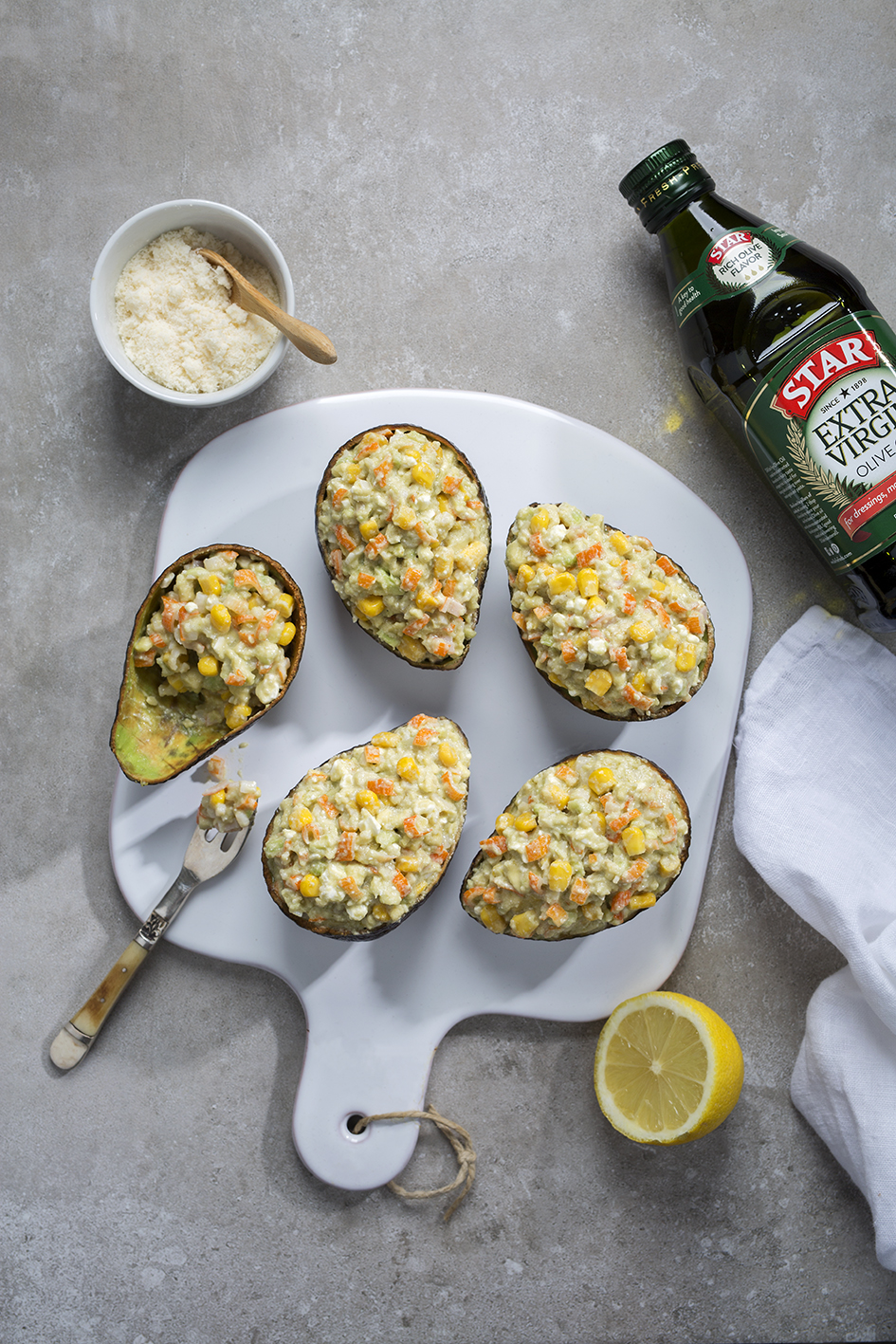 Avocados stuffed with crab sticks and feta