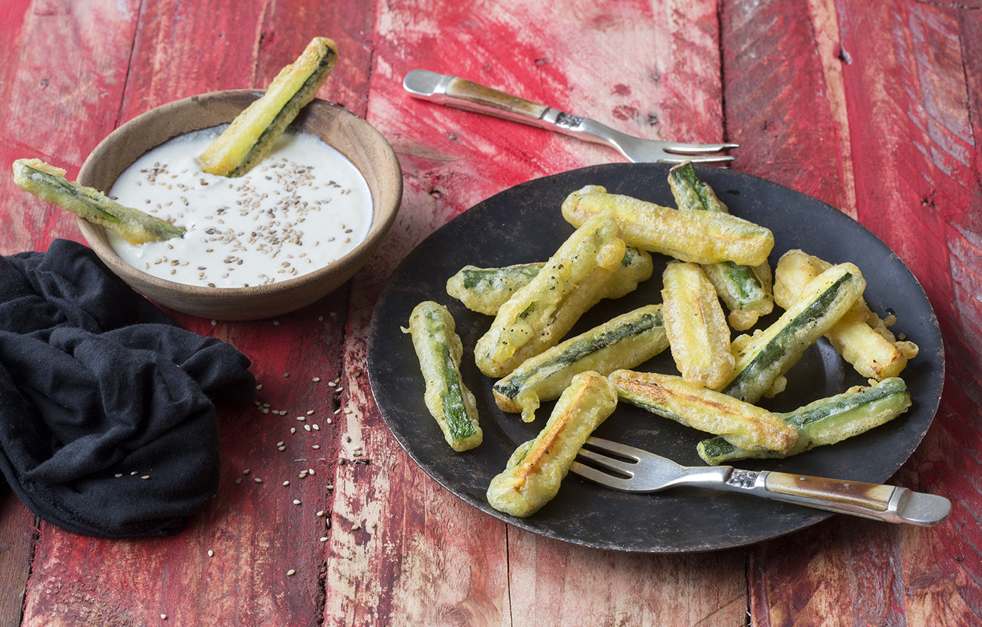 Fried zucchini sticks with cheese dip